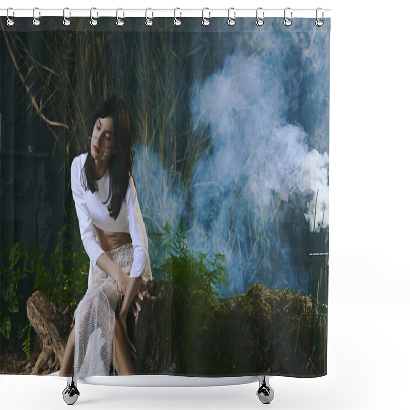 Personality  A Woman Dressed In White Poses Amidst A Smoky, Natural Setting. Shower Curtains