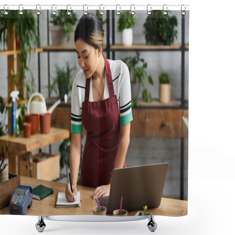 Personality  A Young Asian Woman In A Red Apron Works At Her Plant Store, Taking Inventory Or Managing Orders. Shower Curtains