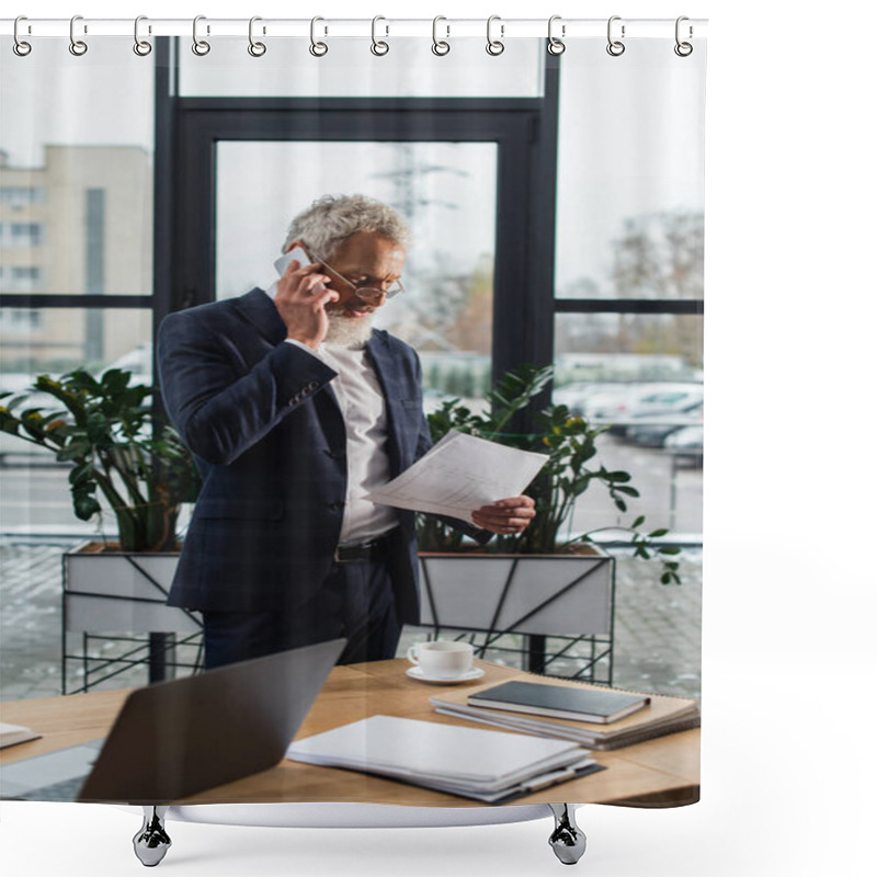 Personality  Mature Businessman Talking On Smartphone And Holding Blueprint Near Coffee In Office  Shower Curtains