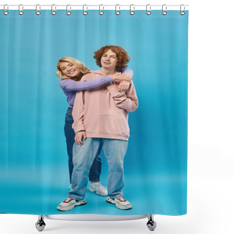 Personality  Joyful Blonde Teen Girl Embracing Redhead Boyfriend, Happy Friends In Hoodies And Jeans On Blue Shower Curtains