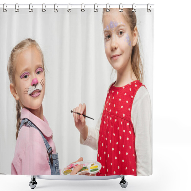 Personality  Smiling Children With Paintings On Faces Holding Palette And Paintbrush While Looking At Camera Isolated On White Shower Curtains