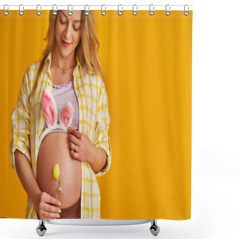 Personality  Close-up, Pregnant Blonde Wearing Bunny Ears On Her Stomach On Easter Day On Yellow Background. Expectant Mother Brings An Easter Egg On A Stick To Her Belly. Woman Is Expecting Child In Spring. Shower Curtains