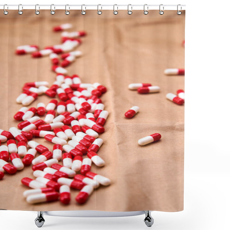 Personality  A Pile Of Red And White Capsules Lying On A Cardboard Surface. Shower Curtains