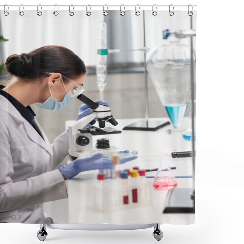 Personality  Scientist In Goggles And Medical Mask Using Microscope Near Flasks And Test Tubes With Blood Samples In Lab  Shower Curtains