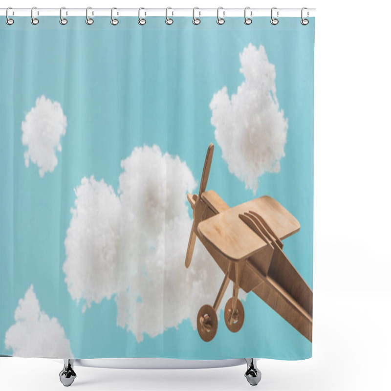 Personality  Wooden Toy Plane Flying Among White Fluffy Clouds Made Of Cotton Wool Isolated On Blue Shower Curtains