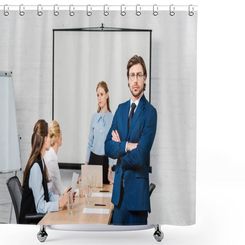 Personality  Handsome Young Businessman With Crossed Arms Looking At Camera At Modern Office With Female Colleagues Sitting On Background Shower Curtains