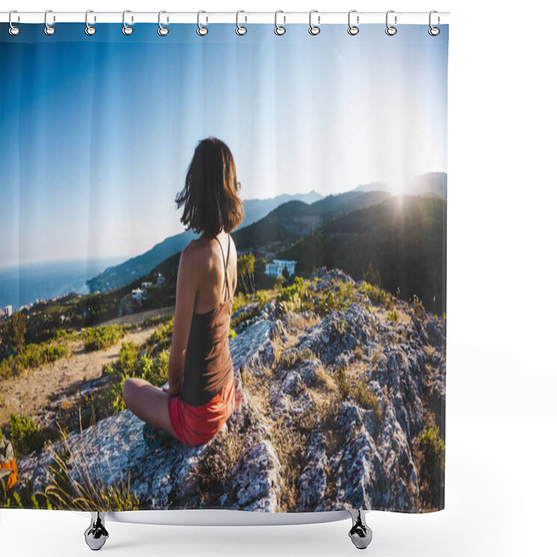 Personality  A Girl Is Sitting On Top Of A Mountain At Sunset. A Woman Is Engaged In Yoga And Sits In A Lotus Position. Meditation Is Far From Civilization. Beautiful Female Back. View Of The Mountains And Sea. Shower Curtains