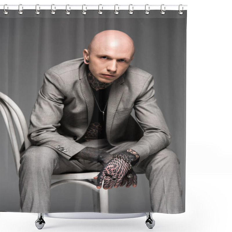 Personality  Handsome Confident Tattooed Man In Suit Sitting On Chair And Looking At Camera Isolated On Grey   Shower Curtains