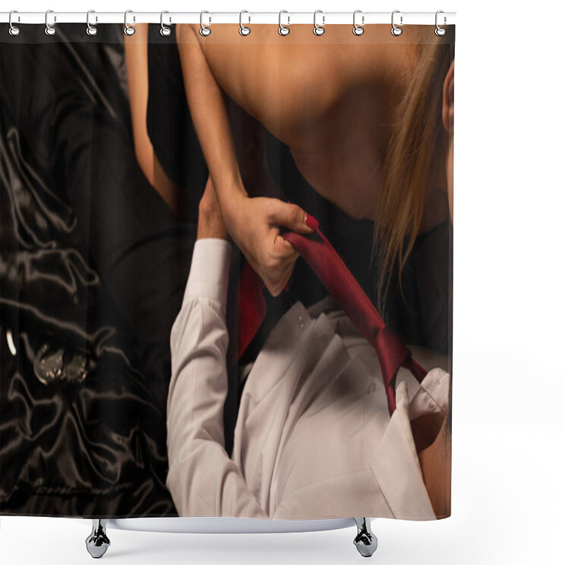 Personality  Cropped View Of Sexy Girl Holding Tie Of Man While Lying In Bed In Dark Room  Shower Curtains