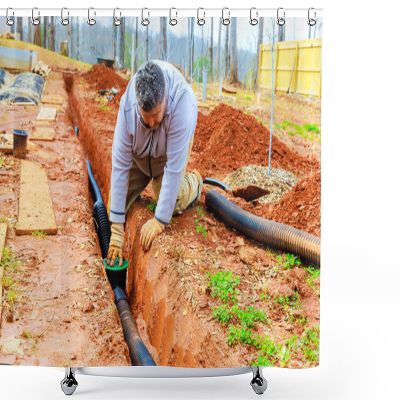 Personality  Man Works Diligently To Place Drainage Pipes In Trench, Ensuring Proper Water Management In Residential Backyard Shower Curtains