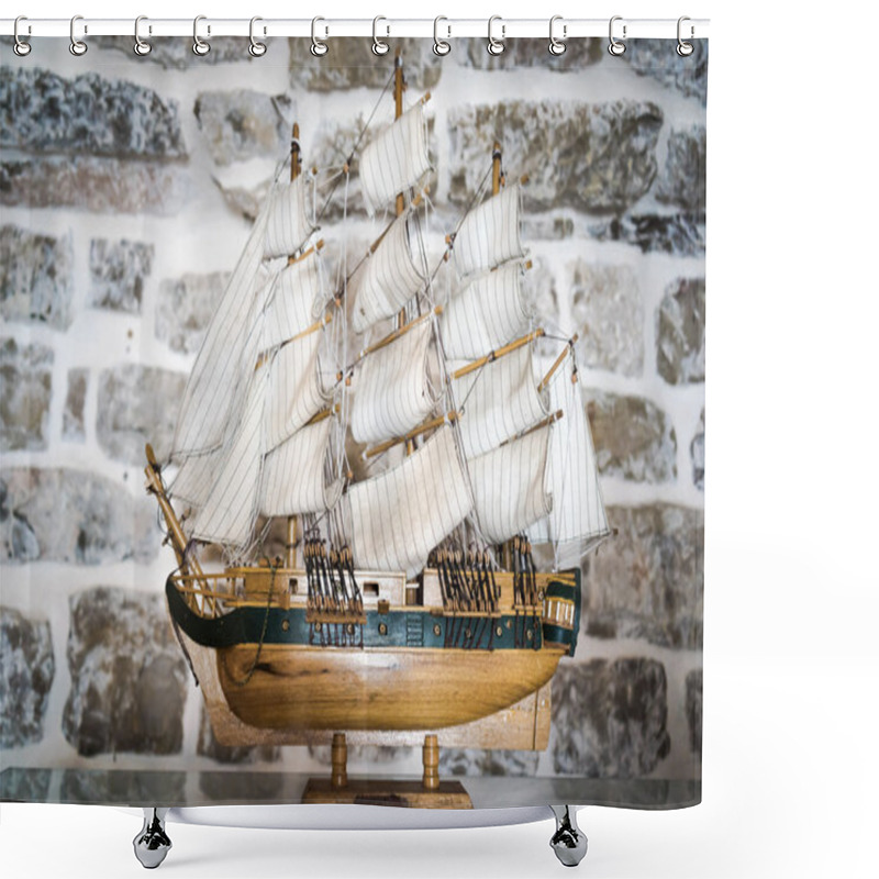 Personality  BUDVA, MONTENEGRO - SEPTEMBER 5, 2015: Wooden Replica Of The Old Vessel Sailfish As Ship Model In A Stone Room Inside The Old Town. Shower Curtains