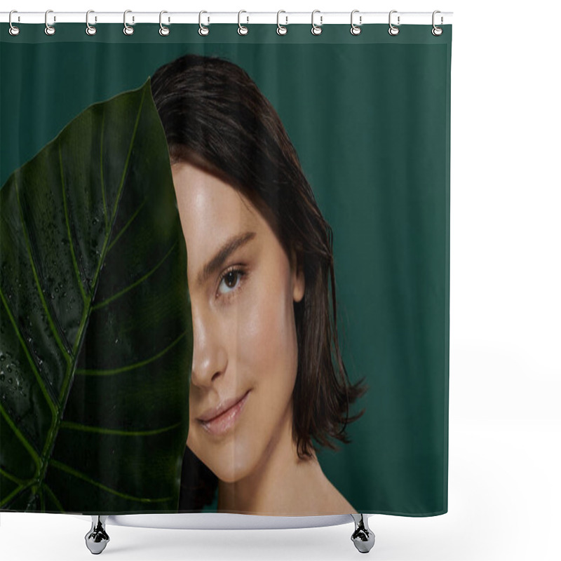 Personality  Woman With Short Dark Hair Behind A Green Leaf Glows Serenely At The Camera. Shower Curtains