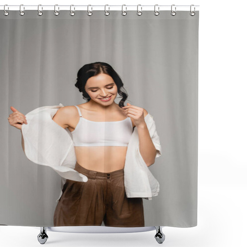 Personality  Smiling Brunette Woman In Top And Leather Pants, Taking Off White Shirt Isolated On Grey Shower Curtains