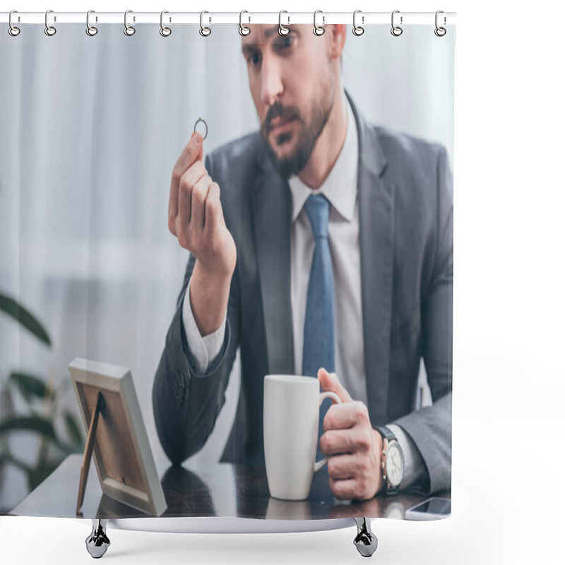 Personality  Selective Focus Of Sad Man In Gray Suit Sitting At Wooden Table And Looking At Ring In Room, Grieving Disorder Concept Shower Curtains