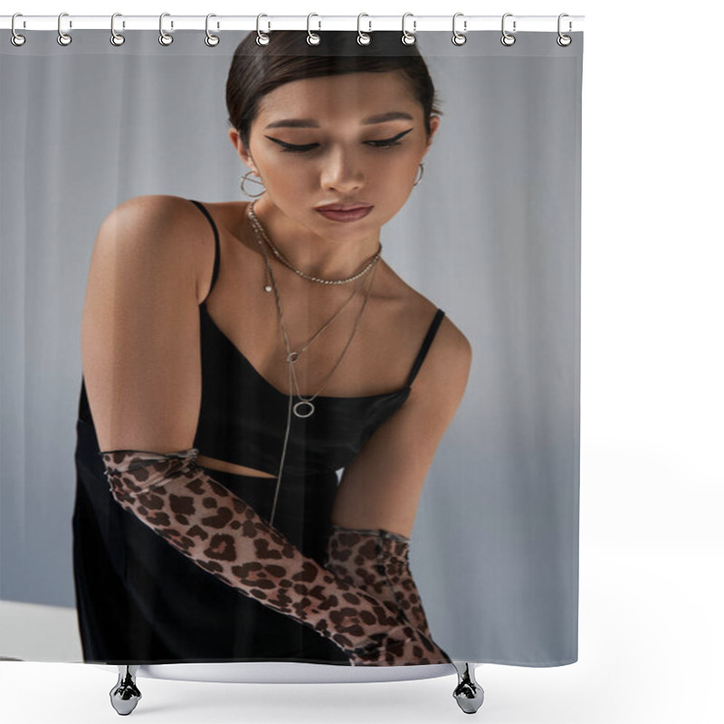 Personality  Fashionable Asian Woman With Bold Makeup, Brunette Hair, Silver Necklaces And Animal Print Gloves Posing In Black Strap Dress On Grey Background, Stylish Spring, Generation Z Shower Curtains