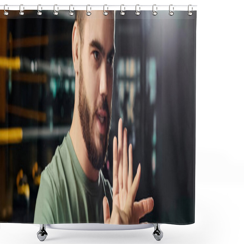 Personality  A Man In A Green Shirt Actively Gestures, Demonstrating A Hand Sign In A Self-defense Training Session. Shower Curtains