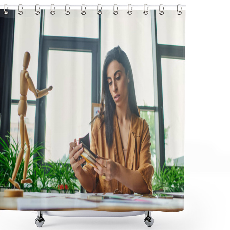 Personality  A Middle Eastern Woman In A Modern Office Thoughtfully Examines A Color Palette, Surrounded By Design Elements. Shower Curtains