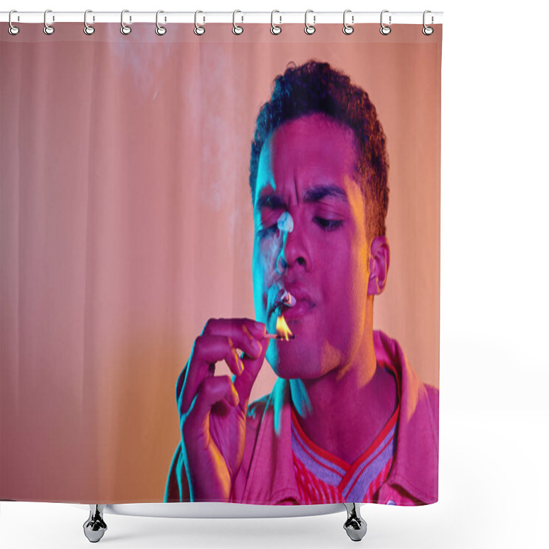 Personality  Young Black Man Lighting Cigarette With Match Under Blue Neon Lights On Pink Background Shower Curtains