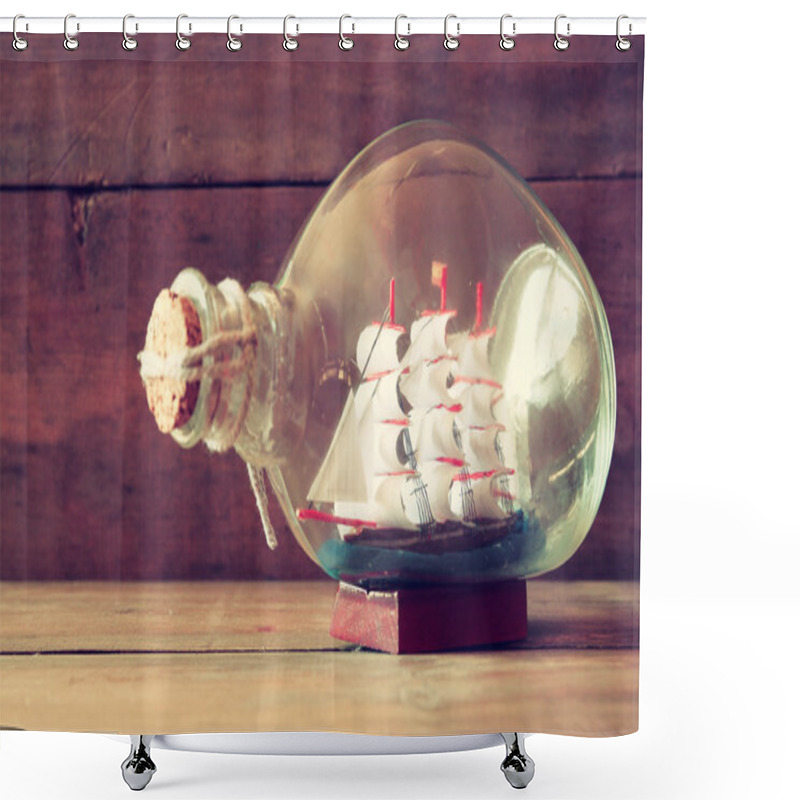 Personality  Image Of Decorative Boat In The Bottle On Wooden Table. Nautical Concept Shower Curtains