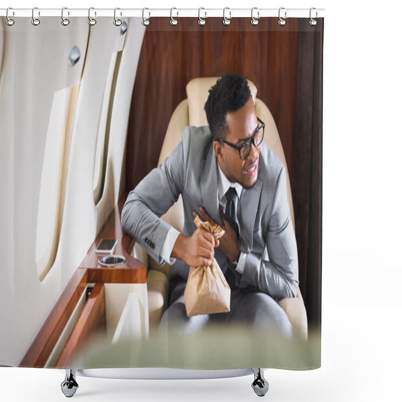 Personality  Nervous African American Businessman Holding Paper Bag While Having Panic Attack During Flight On Private Plane Shower Curtains