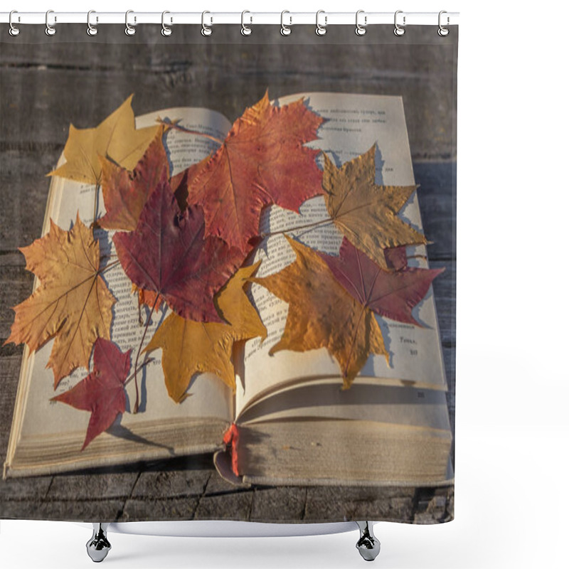 Personality  An Old Thick Opened Book With A White Cloth Cover And A Group Of Dry Autumn Leaves Herbarium Maple Red And Yellow Is On The Surface Of The Old Wet Gray Boards. Shower Curtains