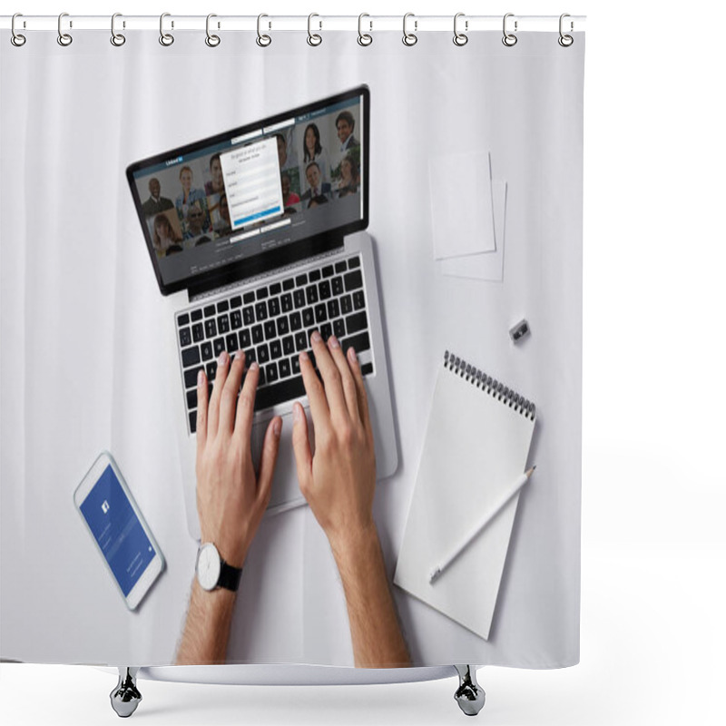 Personality  Cropped Shot Of Man Using Laptop With Linkedin Website On Screen And Facebook App In Smartphone At Workplace On White Surface Shower Curtains