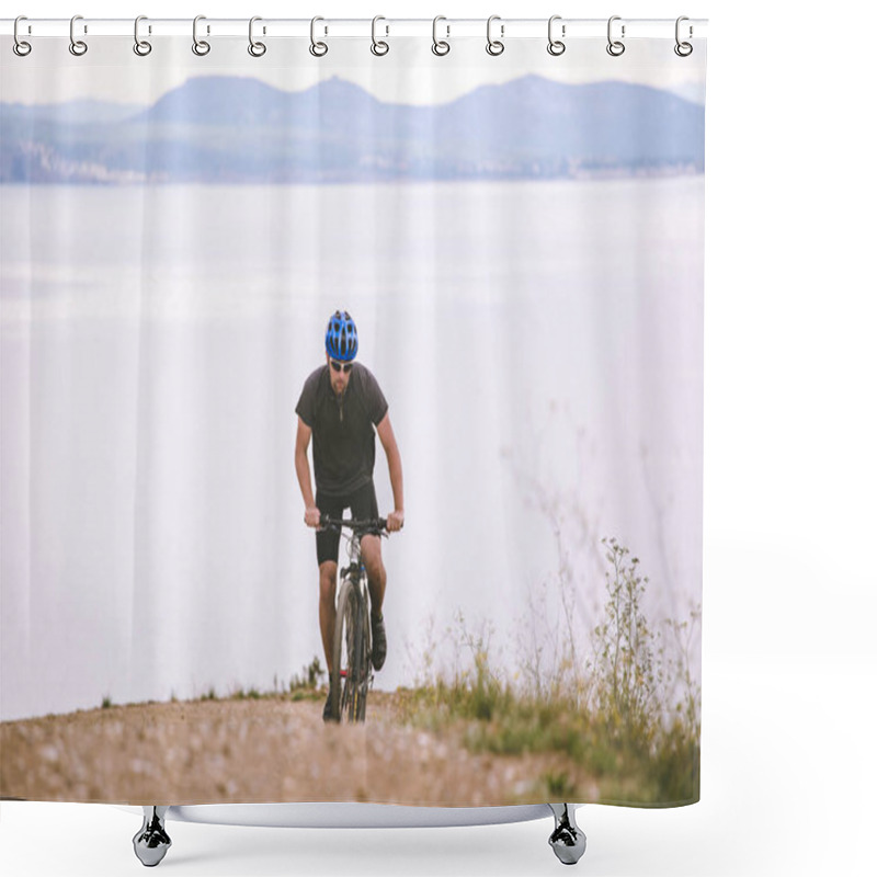 Personality  Theme Tourism And Cycling On Mountain Biking. Guy Rides Uphill On A Rocky, Rocky Road Against The Background Of The Mediterranean Sea In Spain On The Shore Of The Kosta Brava In Helmet And Sportswear Shower Curtains