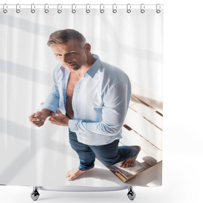 Personality  High Angle View Of Handsome Adult Man Buttoning Shirt And Looking At Camera On White Shower Curtains