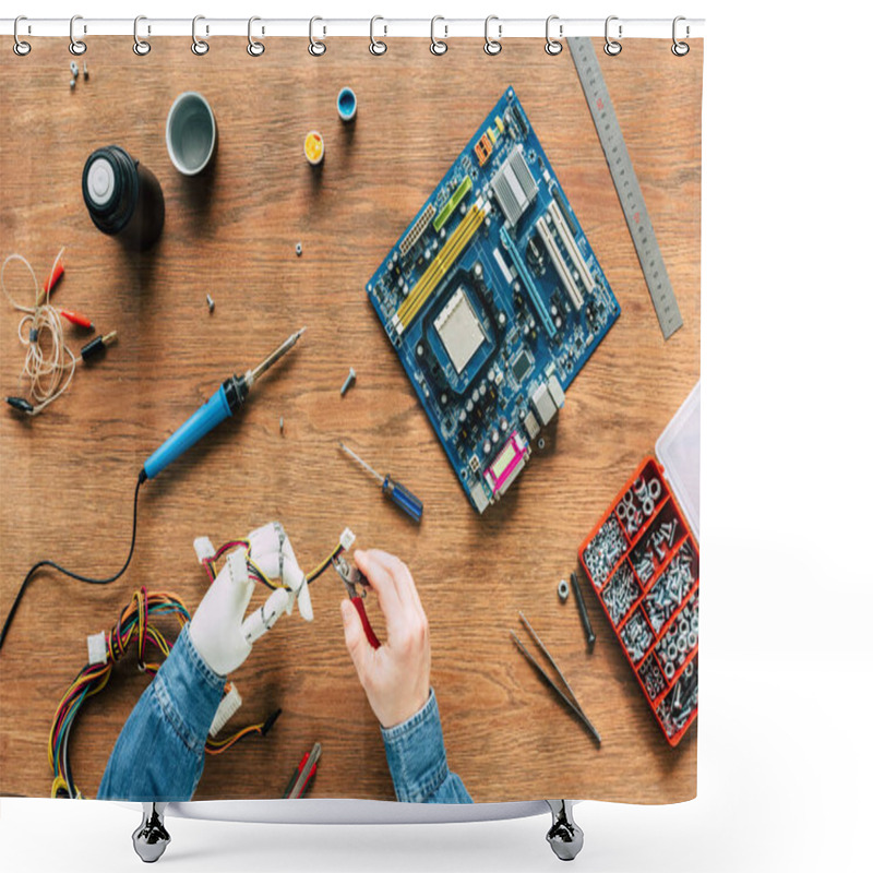 Personality  Cropped Image Of Man With Robotic Hand Cutting Wires By Nippers Over Table  Shower Curtains