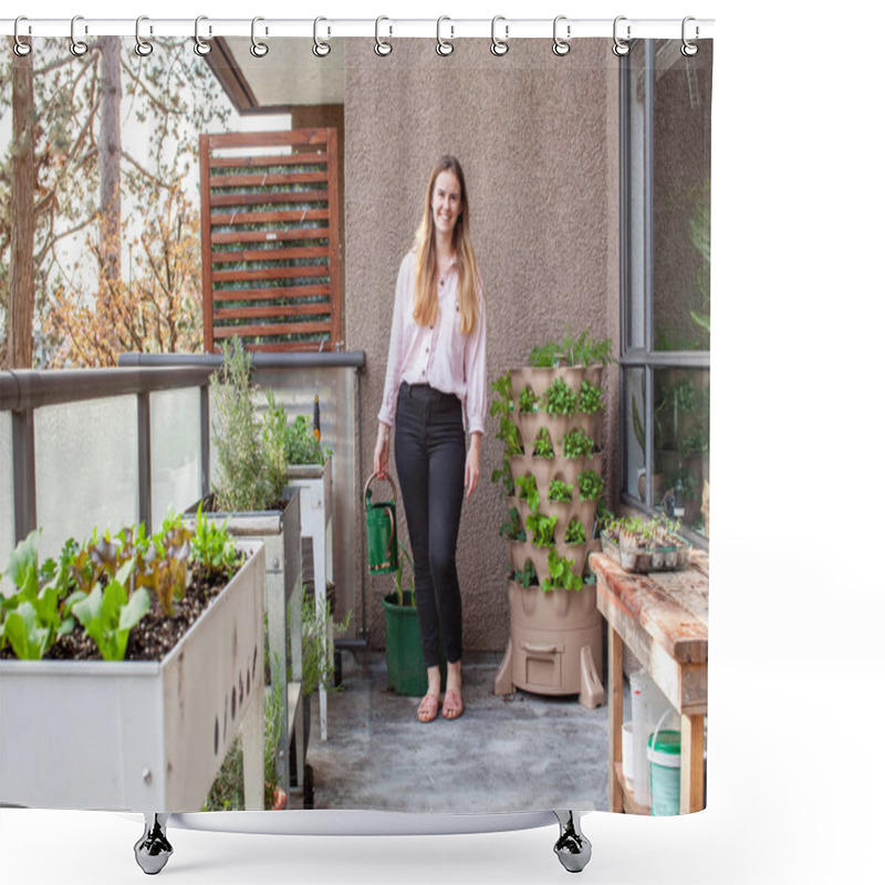 Personality  A Young Blonde Woman Is Planting A Vertical Tower Garden With Herbs And Vegetables On Her Urban Apartment Patio, In The Early Spring. She Is Holding A Watering Can, Ready For Gardening Season Shower Curtains