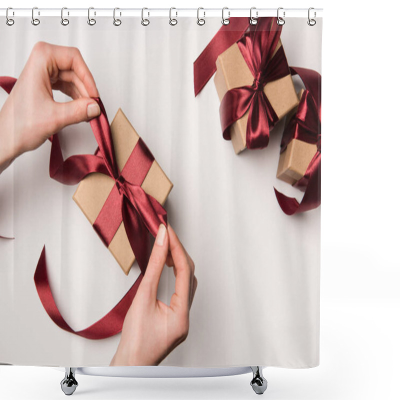 Personality  Partial View Of Woman Tying Ribbon On Gift Box Isolated On White Shower Curtains