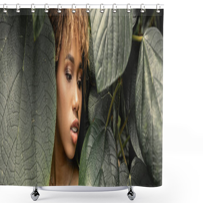 Personality  Modern Young African American Woman With Makeup Looking At Green Leaves While Standing Near Plants In Indoor Garden, Stylish Woman Enjoying Lush Tropical Surroundings, Banner  Shower Curtains