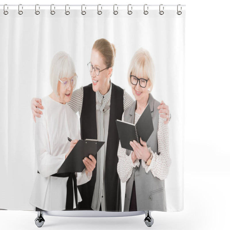 Personality  Two Senior Stylish Businesswomen Writing In Clipboard And Textbook While Mature Businesswoman Holding Their Shoulders Isolated On White Shower Curtains