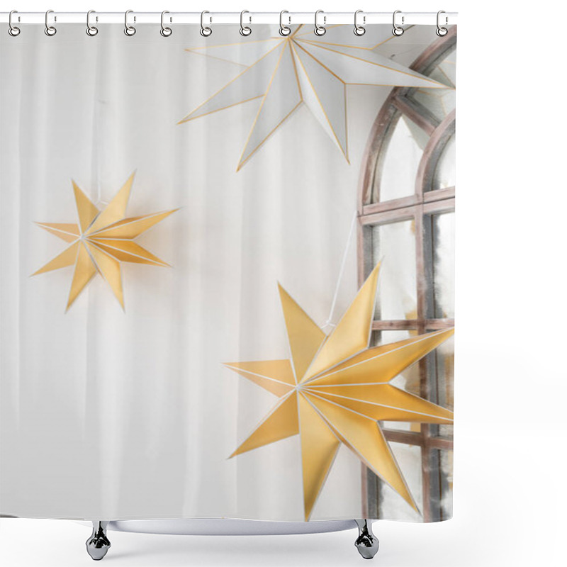 Personality  Golden And Silver Decorative Stars Hanging By A Window In A Cozy Interior, Creating A Warm Ambiance During The Holiday Season Shower Curtains