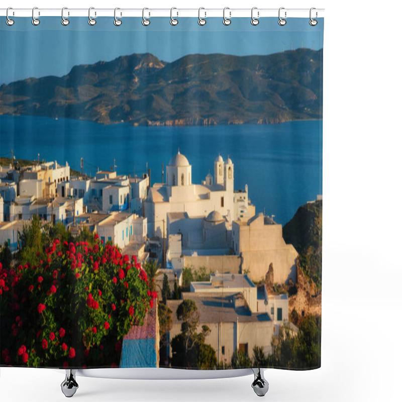 Personality  View Of Plaka Village On Milos Island Over Red Geranium Flowers On Sunset. Plaka Town, Milos Island, Greece.. Focus On Flowers Shower Curtains