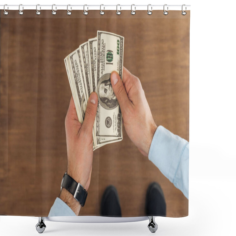 Personality  Top View Of Man Holding Dollars Banknotes On Wooden Background Shower Curtains