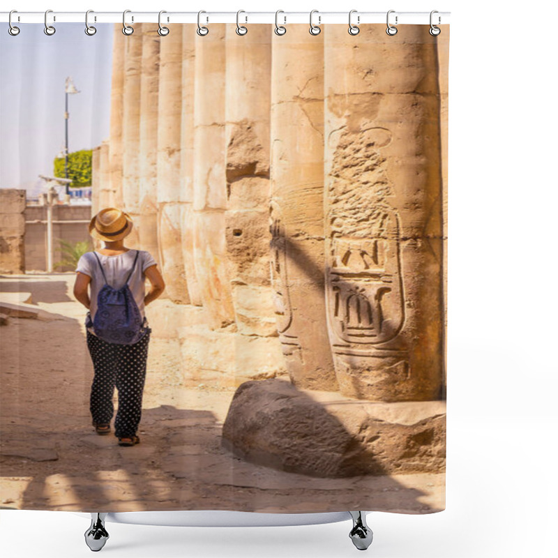 Personality  A Young Tourist In A White T-shirt And Hat Visiting The Temple And Looking At The Ancient Egyptian Drawings On The Columns Of The Luxor Temple, Egypt Shower Curtains