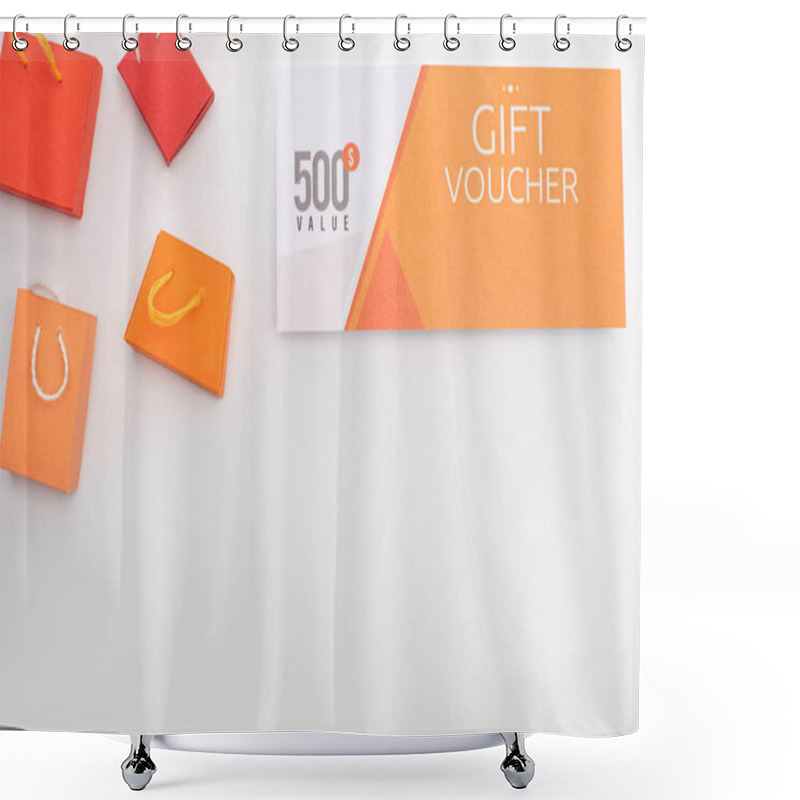 Personality  Top View Of Gift Voucher With 500 Dollars Value Lettering Near Toy Shopping Bags On White Background With Copy Space Shower Curtains