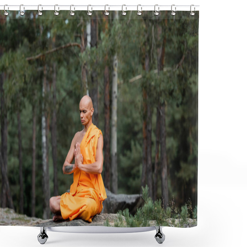 Personality  Buddhist Monk In Orange Kasaya Sitting In Lotus Pose With Praying Hands While Meditating In Forest Shower Curtains