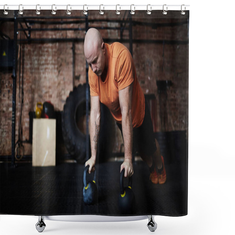 Personality  Middle-aged Sportsman Doing Push-ups With Kettlebells During Intensive Workout In Modern Gym, Full-length Portrait Shower Curtains