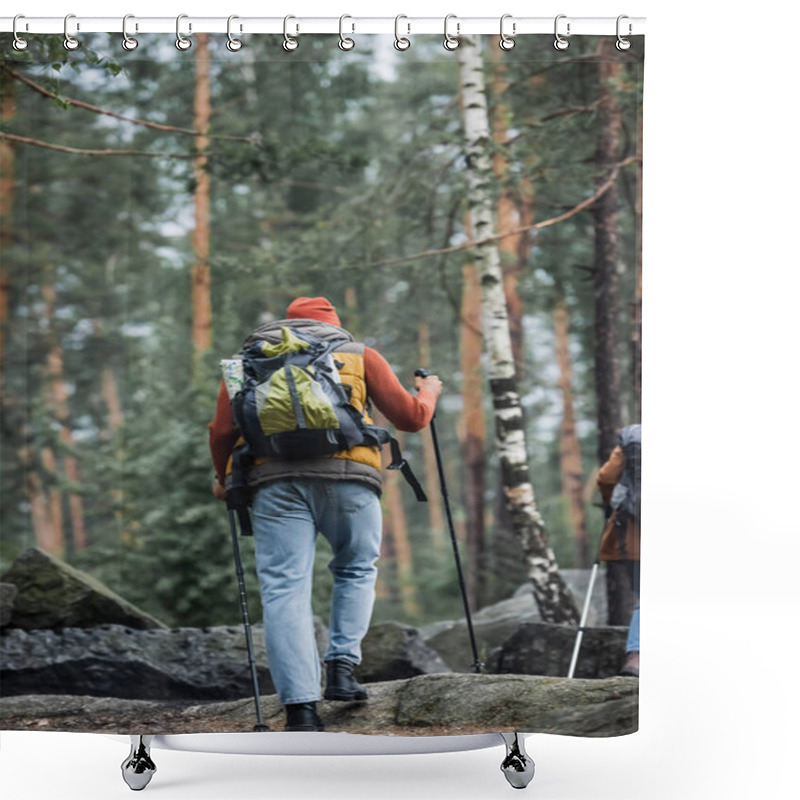 Personality  Back View Of Man Walking With Hiking Sticks Near Woman In Woods Shower Curtains