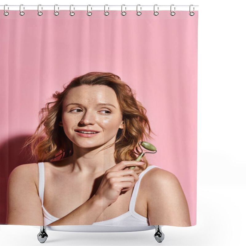 Personality  An Attractive Woman In A White Tank Top Gracefully Holding A Delicate Face Roller. Shower Curtains