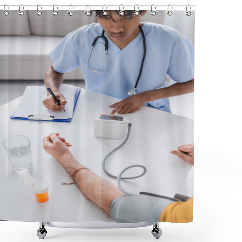 Personality  African American Nurse Writing On Clipboard Near Tonometer And Senior Patient At Home  Shower Curtains