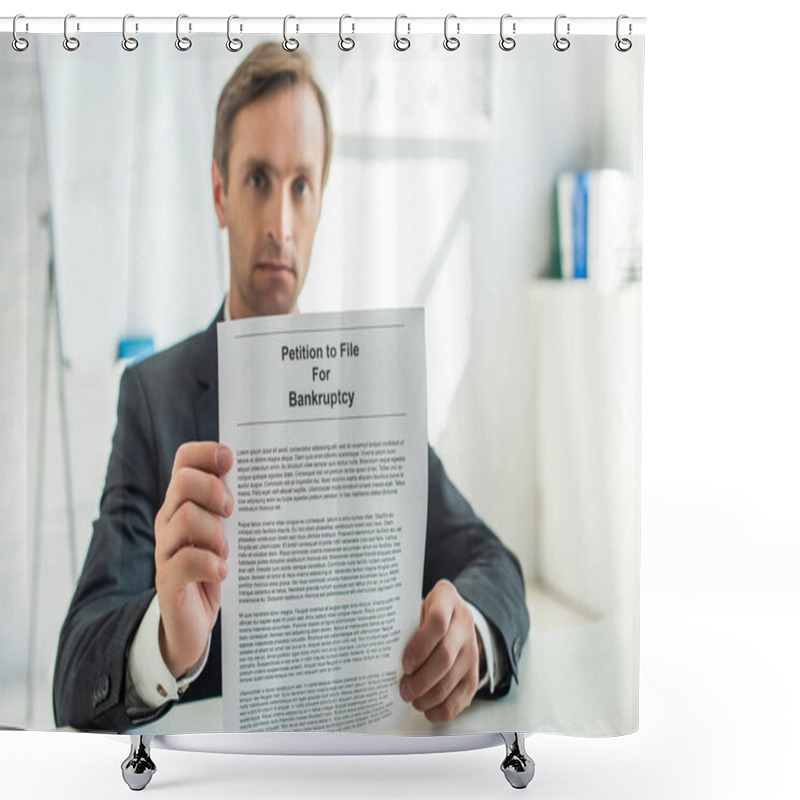 Personality  Serious Businessman Looking At Camera And Showing Petition For Bankruptcy, While Sitting At Desk On Blurred Background Shower Curtains