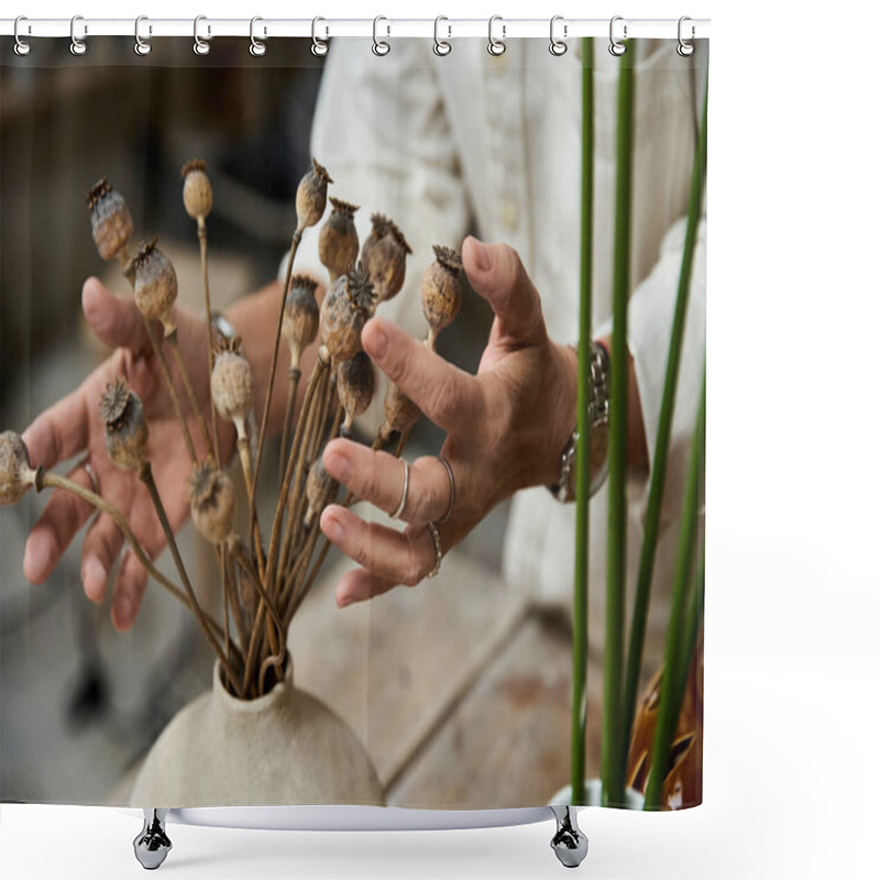 Personality  A Mature Woman Delicately Arranges Dried Poppy Flowers In A Rustic Vase While Focusing Intently. Shower Curtains