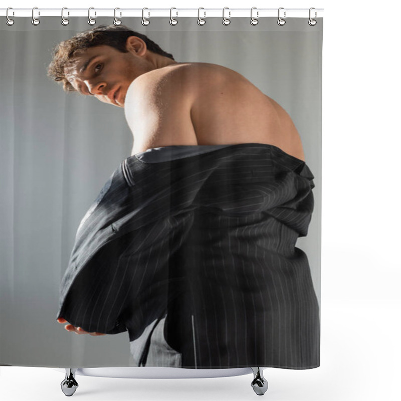 Personality  Low Angle View Of Sexy Shirtless Man Looking At Camera And Taking Off Black Blazer Isolated On Grey Shower Curtains