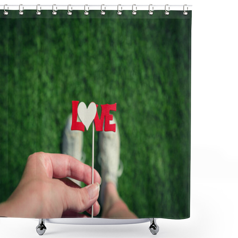 Personality  Close Up Of Female Holding Stick With Love Sign And Standing On  Shower Curtains