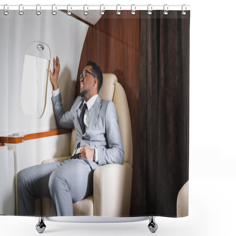 Personality  Nervous African American Businessman Holding Safety Belt And Suffering From Panic Attack During Flight On Private Plane Shower Curtains