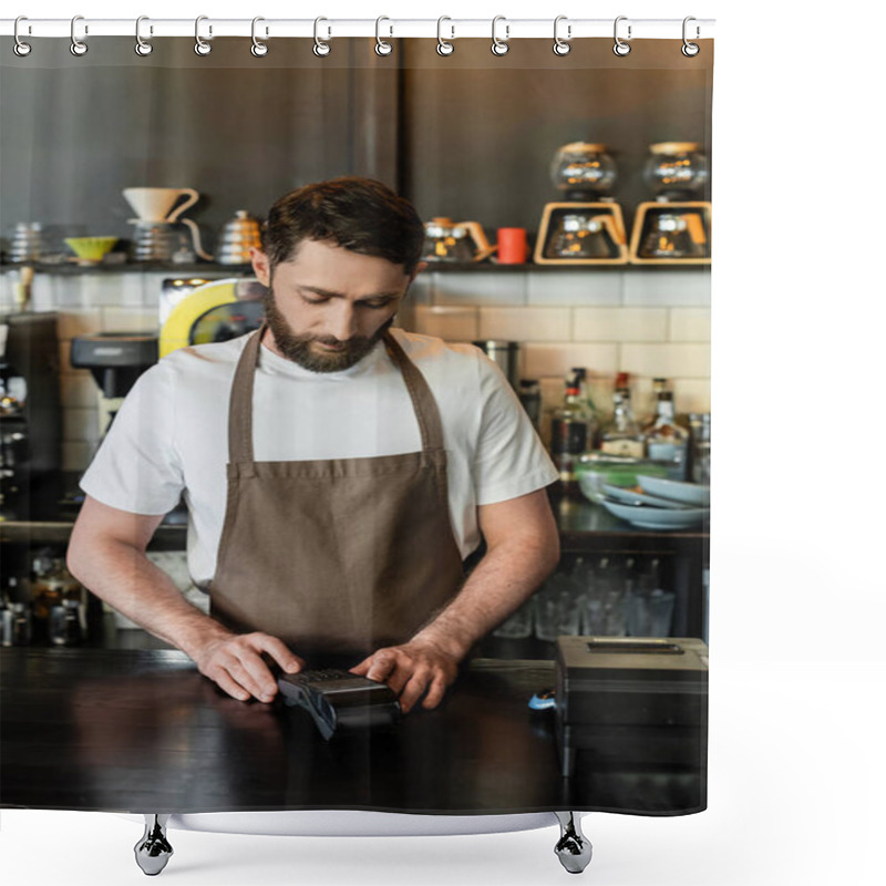 Personality  Bearded Barista In Apron Using Payment Terminal On Bar While Working In Coffee Shop Shower Curtains