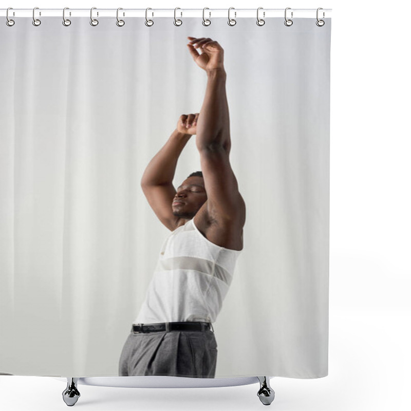 Personality  Portrait Of Young And Muscular Afroamerican Man In Sleeveless T-shirt And Pants Raising Hands Isolated On Grey, Contemporary Shoot Featuring Stylish Attire, Closed Eyes Shower Curtains